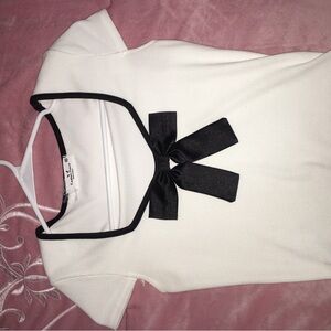 Elegant White Top with Black Bow